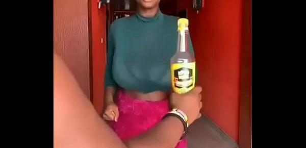  GHANA GIRL OPENS A BOTTLED DRINK WITH HER BREASTS